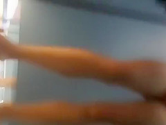 Athletic chick wipes off in a pool cabin