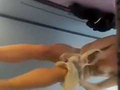 Athletic chick wipes off in a pool cabin