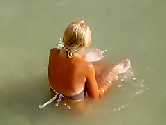 Perfect pale ass rides a dick on a beach