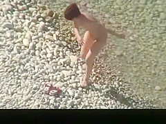 Redhead nudist with small boobs spied