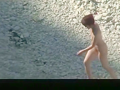 Redhead nudist with small boobs spied
