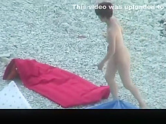 Redhead nudist with small boobs spied