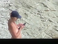 Busty nudist woman with trimmed pussy