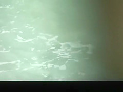 Busty nudist woman with trimmed pussy