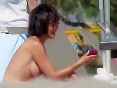Adorable topless babe with big tits