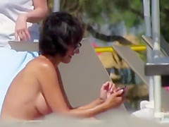 Adorable topless babe with big tits