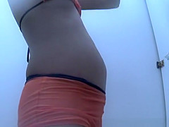 Girl spied in beach cabin changing