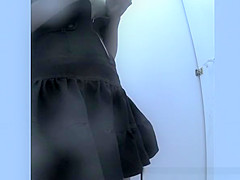 Girl spied in beach cabin changing