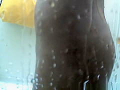 Hot ass babe in shower cabin