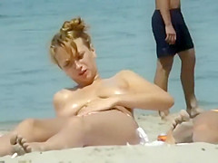 Big natural boobs are getting oiled up