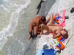 Spying foreplay and sex on the beach
