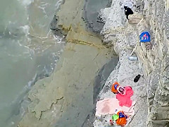 Spying foreplay and sex on the beach