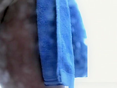 Chubby milf spied in beach cabin