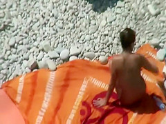 Hot teen girls cover friend with sand