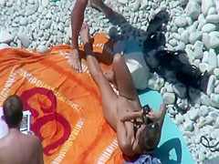 Hot teen girls cover friend with sand