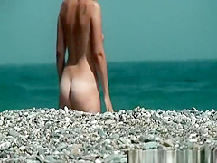 Nudist and topless women on the beach