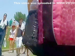 Following a cute teen girl to the beach