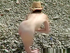 Nude wife and husband secretly filmed in beach