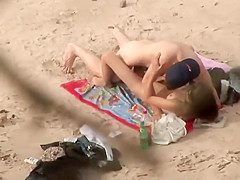 Passionate sex caught on the beach