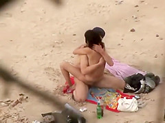 Passionate sex caught on the beach
