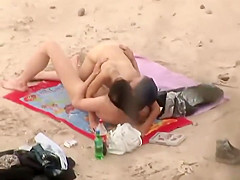 Passionate sex caught on the beach