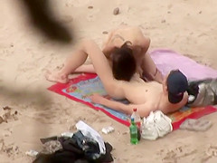 Passionate sex caught on the beach