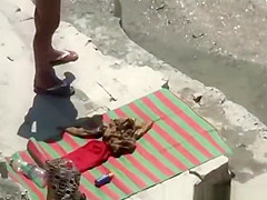 Nude woman refreshing in the water