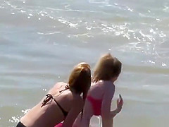 Big tits teen in red bikini at beach