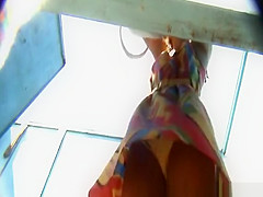 Woman in dressing room on the beach