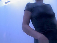 Small tits woman changes in cabin