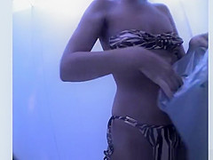 Small tits woman changes in cabin