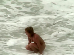 Stupid girl washes hair with seawater