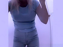 Woman changes bikini for bra and shorts