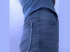 Woman changes bikini for bra and shorts