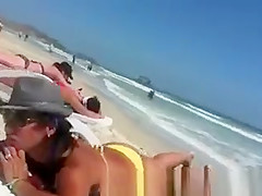 Woman with a big ass on the beach