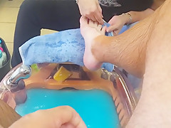 Cock flash and jack off cum shot while getting pedicure