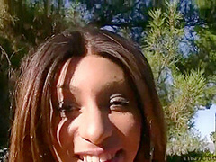Teen masturbates outdoors in close up scene