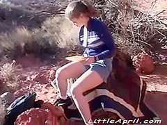 Outdoor teen masturbates in solo session