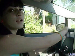 Teen toys her tight cunt in a car