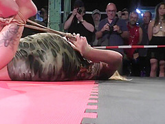 Blond Girl Tied Live On Stage