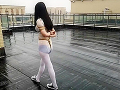 Asian Girl Cuffed On The Roof