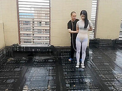 Asian Girl Cuffed On The Roof