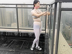 Asian Girl Cuffed On The Roof