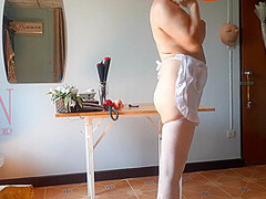The Naked Secretary In The Office Wiht White Apron Blows Balloons, Masturbates