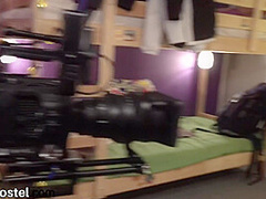 Voyeuristic babe joins busty brunette for hostel threesome