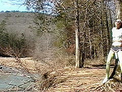 Milf Tied To Tree With Vibrator On Puss Til She Pisses Her Shorts