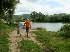 A Blond Girl Washes Herself By The River And Two Old Men See