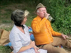 A Blond Girl Washes Herself By The River And Two Old Men See
