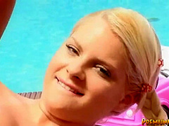 Petite blonde toys her hot pink pussy