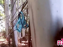 Solo teen fondling her pussy outdoors